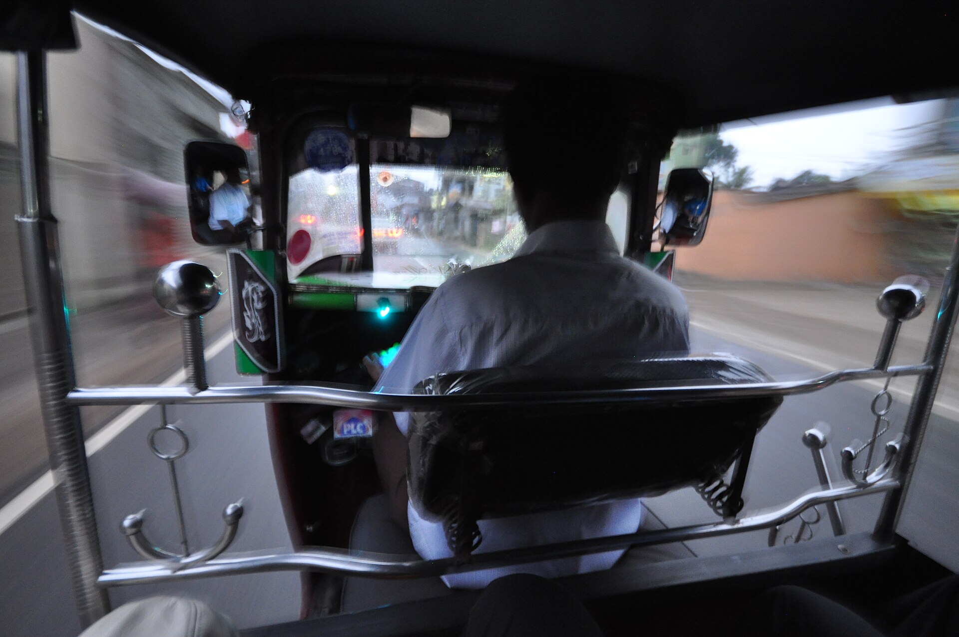 Riding through the streets in a Sri Lankan tuk tuk